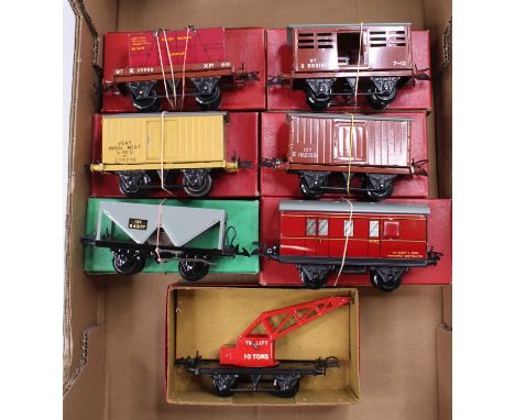 Seven post-war items of Hornby 0-gauge rolling stock. All (NM-M) (BNM-M): No.1 Crane truck; No.50 hopper; No.1 BR goods van; 