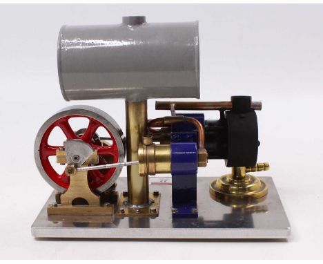 A scratch built from brass, copper and gunmetal components, stationary horizontal hot air engine, comprising of horizontal he