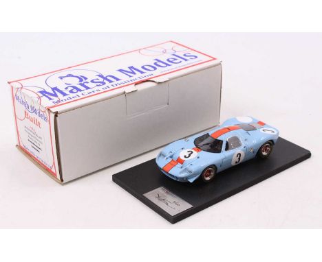 A Marsh Models 1/43 scale factory hand-built model of an MM250 MB3 Mirage M1 1967 Brands Hatch race car, as driven by Rodrigu