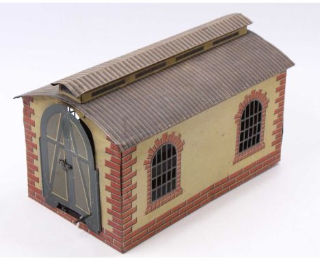Bing single road 0-gauge engine shed, cream walls with red brickwork quoins, brown window frames, green &amp; grey doors one 