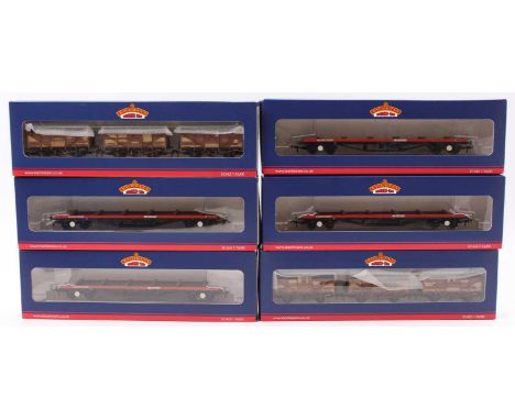 Six boxed Bachmann Branch-Line goods wagons, all (M) (BM): four 38-159 BDA bogie bolster Railfreight wagons with steel beams;
