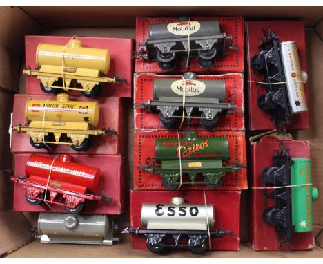 Ten Hornby tank wagons: Pre-war – Esso, buff (NM) (BE); Shell/BP, buff (E-NM) (BVG); Royal Daylight, red with gold lettering 