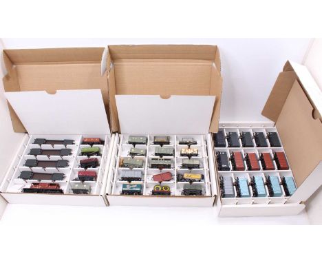 Three Bachmann Collectors’ Club storage boxes filled with approx 74 assorted goods wagons, Hornby breakdown crane and two Bac