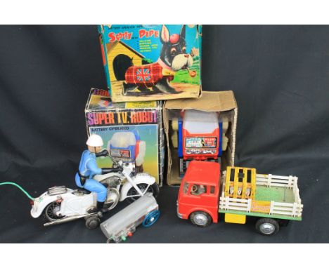 Japanese tinplate Ol' McDonalds farm truck with reticulated chickens. Japanese remote control motorbike rider battery operate