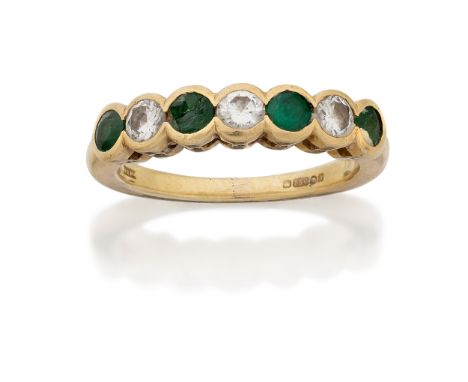 An 18ct gold emerald and diamond five stone half eternity ring, the half-hoop collet-set with three brilliant-cut diamonds an