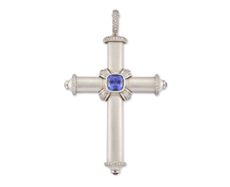 Theo Fennell. An 18ct white gold tanzanite and diamond cross pendant, a central cushion cut tanzanite with a stated weight of