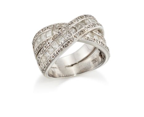 A diamond ring of crossover design, composed of a central row of princess-cut diamonds bordered by a row of brilliant and old