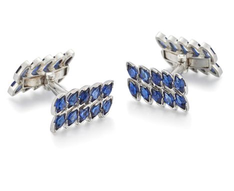 A pair of synthetic sapphire cufflinks, designed as rectangular twin panels set with two rows of marquise-cut synthetic sapph