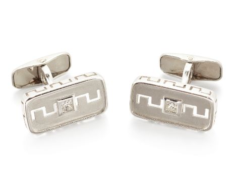 A pair of diamond set cufflinks, rectangular panels each collet set with a princess-cut diamond, to pierced, satin finish gro