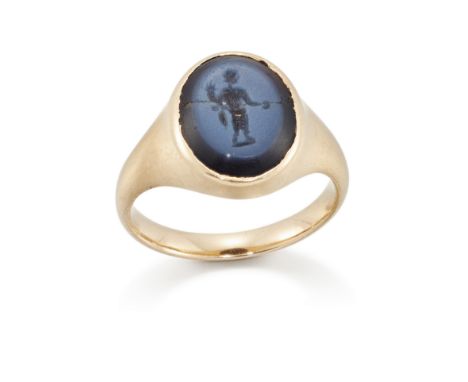A 19th century gold, Roman intaglio ring, the oval nicolo intaglio depicting the figure of Luna bearing torch, ring size NCon