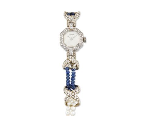 Delaneau. An 18ct white gold, diamond, sapphire and cultured pearl bracelet watch (AF) Circa 1980 Manual wind movement, silve