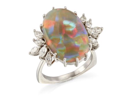 An opal and diamond ring, the claw-set oval opal with marquise diamond five stone shoulders, approximate dimension of opal 19