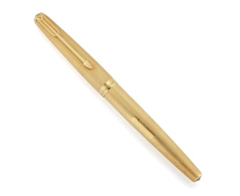 An 18ct gold Parker fountain pen, designed with hooded nib and engine turned gold barrel and cap, vacant cartouche, London ha