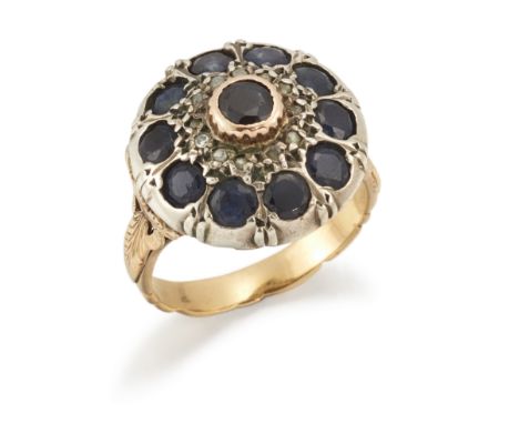 A sapphire and diamond cluster ring, of circular cluster design set with sapphires and lasque-cut diamonds (one single cut di