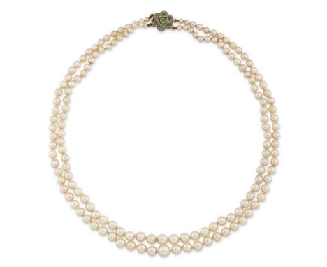 A cultured pearl necklace, the graduated double row to an Edwardian demantoid garnet and rose-cut diamond clasp, dimensions o