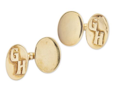 A pair of oval cufflinks, one panel with applied initials 'GH', with clip connections, stamped 750Condition Report:  Gross we