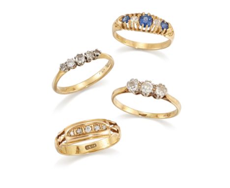 Four diamond and gem rings, comprising: a brilliant-cut diamond three stone ring; a brilliant-cut diamond graduated five ston