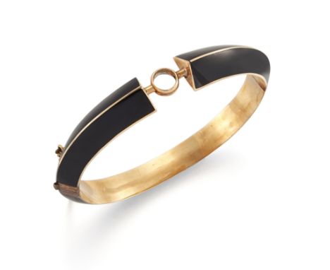 A Continental black enamel bangle, of hinged, hollow, chevron section form, with a central vacant collet, to box clasp and sa