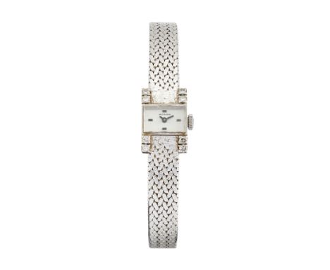 Movado. An 18ct white gold and diamond set manual wind bracelet watch  Circa 1960 Jewelled manual wind movement, silvered dia