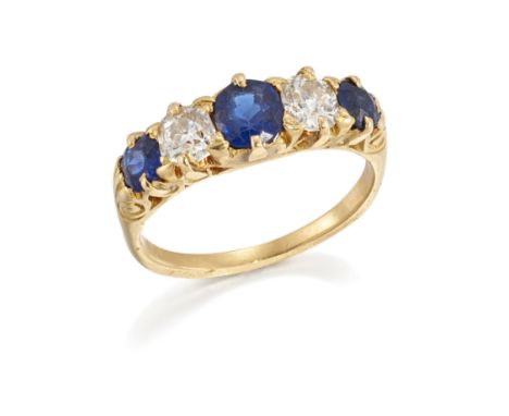 A sapphire and diamond half hoop ring, set with two old-brilliant-cut diamonds and three cushion-cut sapphires in claw-set mo