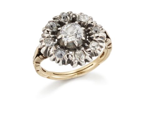 A Georgian diamond cluster ring, converted from a button, the central silver mounted closed-set old-mine-cut diamond with clo