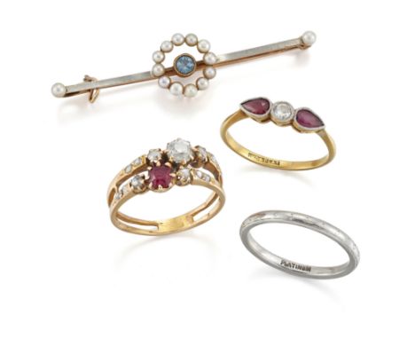 Three rings and a bar brooch, comprising; a ruby and diamond ring of double design, ring size O; a ruby and diamond three sto