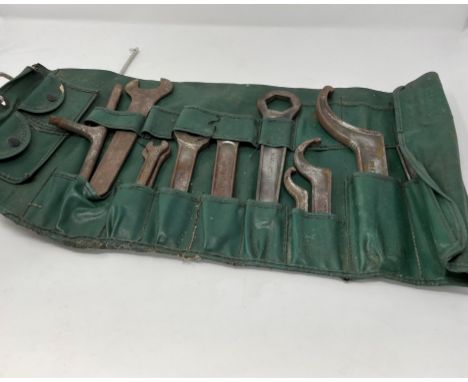 A selection of marked spanners and accessory tools suitable for Rolls-Royce 20hp and later types.11 original pieces in green 