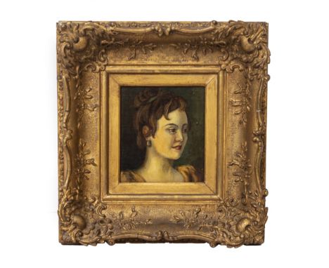 A HEAD AND SHOULDER PORTRAIT OF A YOUNG LADY oil on board, mounted in a 19th century gilded gesso frame, the picture 10cm x 9