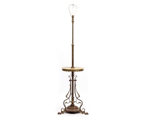 A VICTORIAN BRASS AND ONYX LAMP STANDARD of adjustable height with circular table and art nouveau style tripod base, the tabl