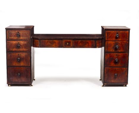 A 19TH CENTURY MAHOGANY BOW FRONTED SIDEBOARD with two side piers with various drawers to include a cellarette drawer with le