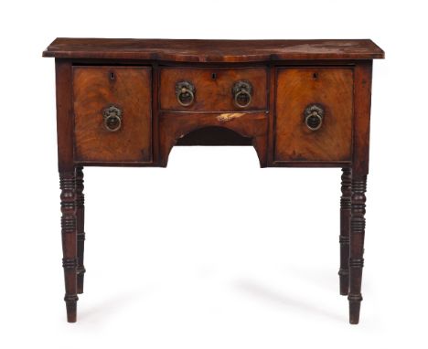 A 19TH CENTURY MAHOGANY BOW FRONTED SIDEBOARD with three drawers and ring turned tapering legs, 112cm x 50.5cm x 95.5cm Condi