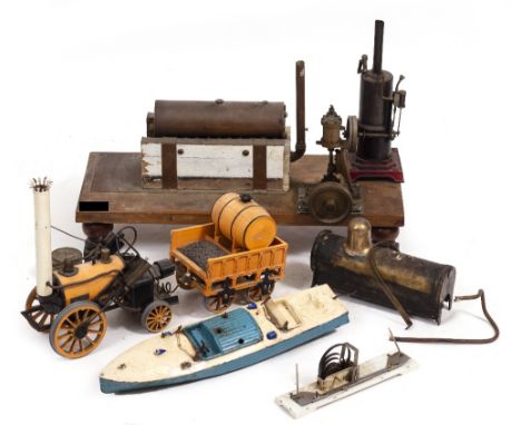 A HORNBY GAS POWERED MODEL LOCOMOTIVE ROCKET together with an early 20th century German vertical stationary steam engine and 