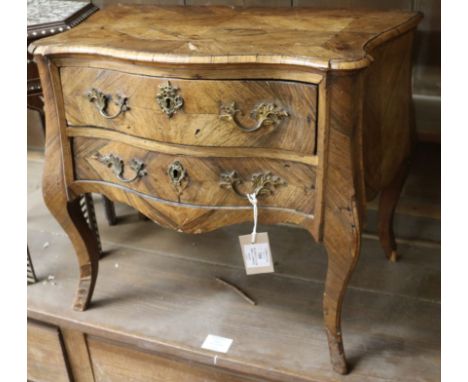An 18th century North Italian walnut commode of small proportions, (some damage to veneers), H 44.5cm (17.5in) W 53.5cm (21in