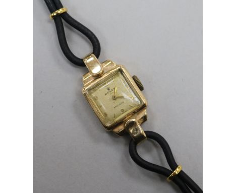 A lady's 9ct gold Rolex precision manual wind wrist watch.