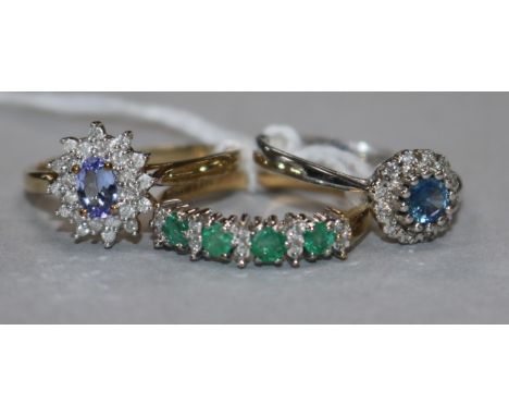 A sapphire and diamond cluster ring, 9ct gold setting and two other rings, including a 9ct white gold, gem and diamond cluste