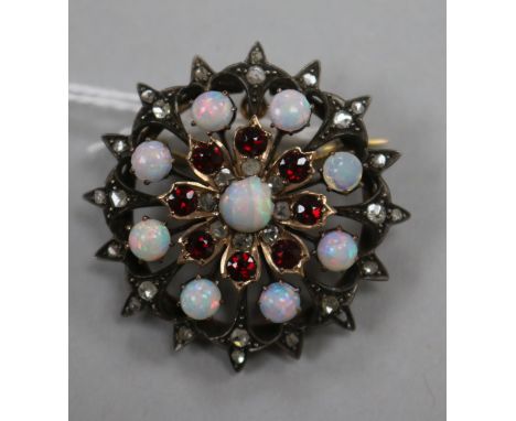 A Victorian white and yellow metal, white opal, garnet and rose cut diamond set pendant brooch, 33mm.