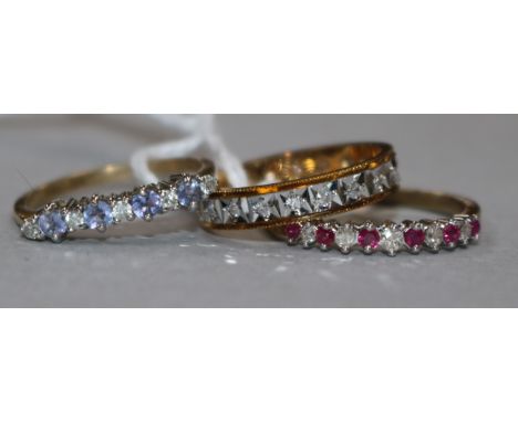 An illusion set diamond full eternity ring, 9ct yellow and white gold setting and two other rings, including a 9ct gold ruby 