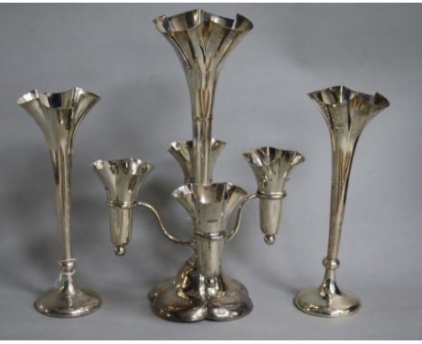 A pair of Edwardian silver posy vases and an Edwardian silver epergne, (a.f.) epergne 25.5cm, all pieces loaded.