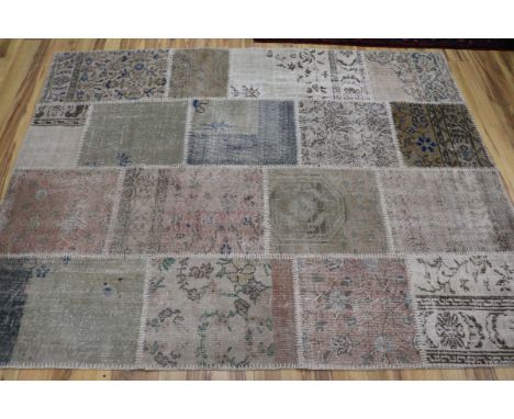 A patch work rug, 220 x 170cm