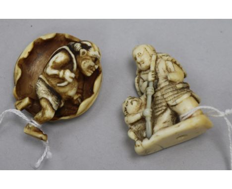 Two Japanese ivory netsuke, 19th century, the first depicting a samurai and a figure crouched at his feet, 4cm, the second an