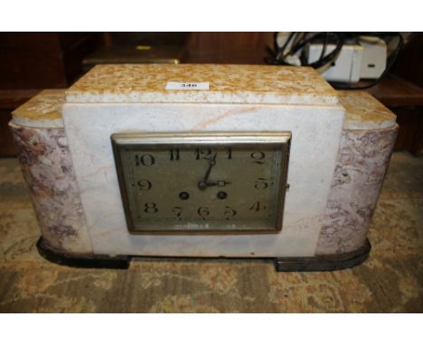 AN ART DECO MARBLE MANTEL CLOCK WITH 'MOUGIN' STAMPED MOVEMENT, H 21 cm, W 40 m  S/DCondition Report:With various nips and cr