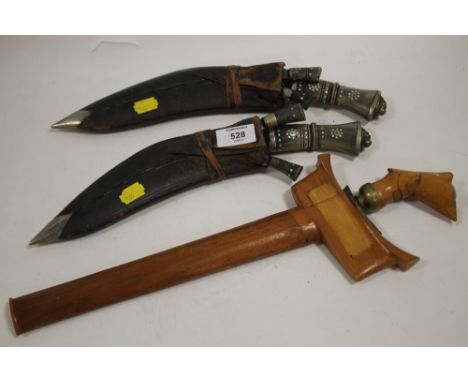 TWO GHURKA KNIFE TRIOS TOGETHER WITH AN EASTERN EXAMPLE