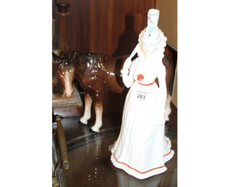 A MELBA WARE HORSE FIGURE TOGETHER WITH A COALPORT HOUSE OF HANOVER FIGURE (2) 