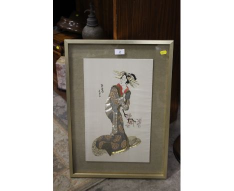 A FRAMED AND GLAZED ORIENTAL NEEDLEWORK PORTRAIT