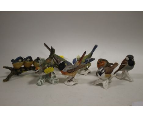 A COLLECTION OF SEVEN GOEBEL SMALL BIRD FIGURES TOGETHER WITH A CAPODIMONTE EXAMPLE (8)