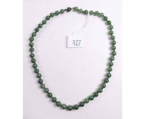 A jade bead necklace