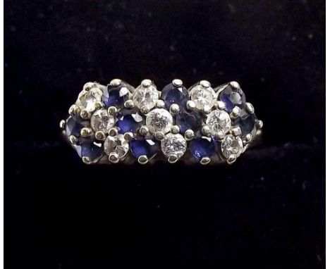 An 18ct gold sapphire and diamond ring , size N