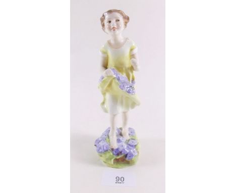 A Royal Worcester figure 'The First Cuckoo' No 3082 modelled by F G Doughty in yellow dress 