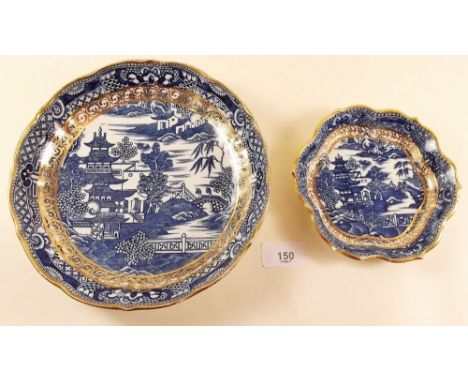 An 18th century Caughley or Worcester saucer dish and another dish printed Two Men on a Bridge, good condition, unmarked