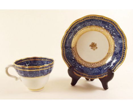 An 18th century Caughley Moth Pattern cup and saucer, S mark to base